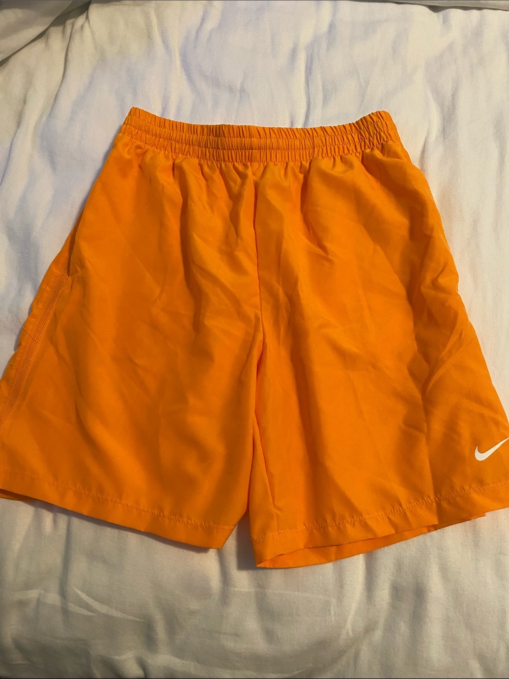 Nike Men's Bright Orange Athletic Shorts with White Swoosh